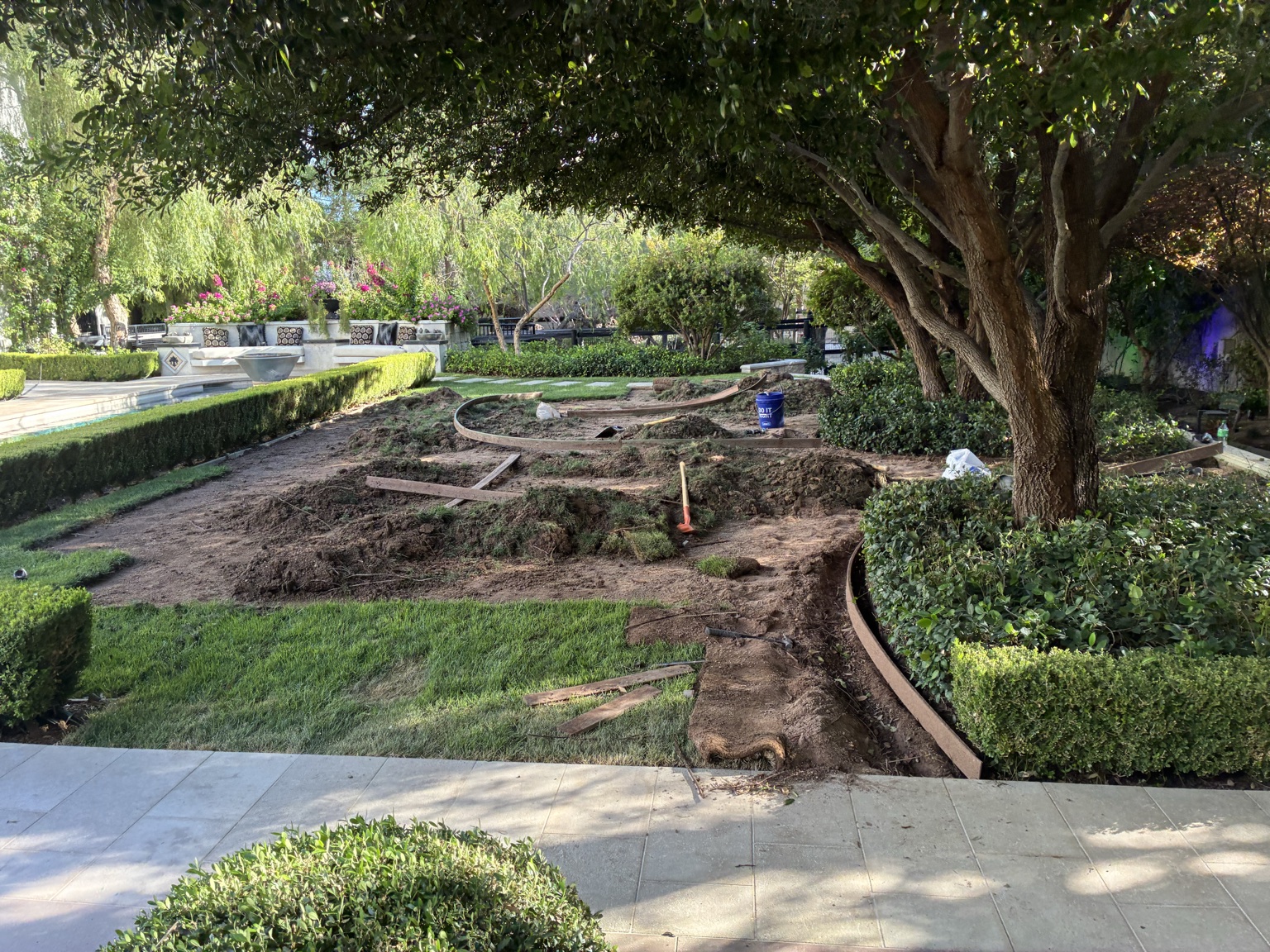 SierraScape crew maintaining an estate garden mid-job