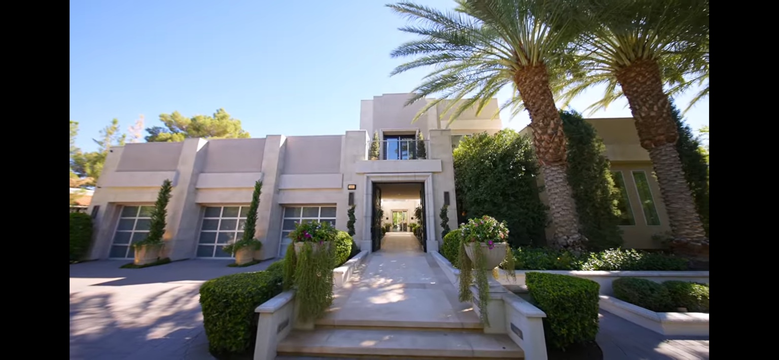 Manicured front entrance of a maintained Las Vegas estate